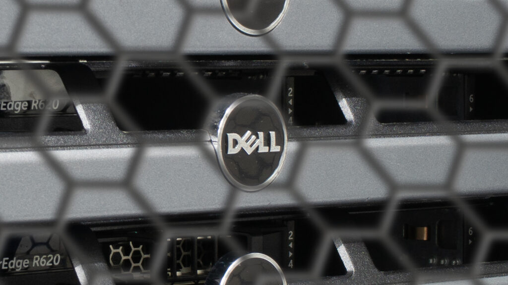 Enterprise rack servers viewed through a perforated security mesh door in our colocation hall